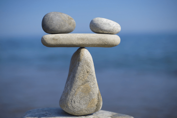 Balancing rocks representing the pros and cons of using an iPaaS