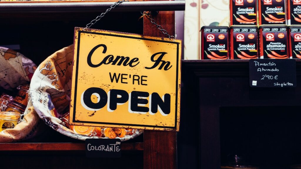 Small business displaying open sign